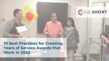 employee receiving recognition at Years of Service presentation
