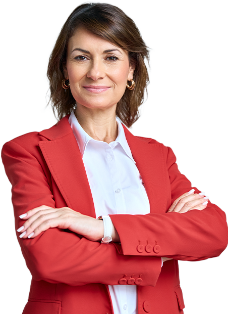 Confident business professional in a red blazer smiling with arms crossed-1