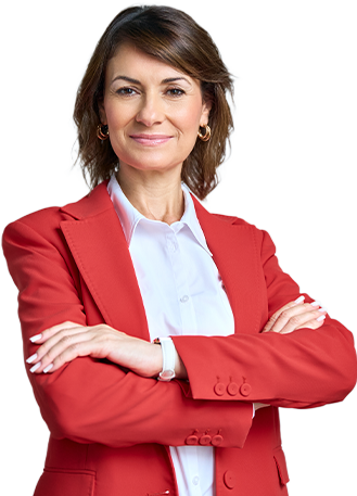 Confident business professional in a red blazer smiling with arms crossed